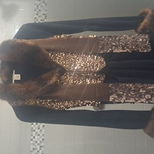 Black midi (sweater?) dress with brown faux fur collar and cuffs. Size M